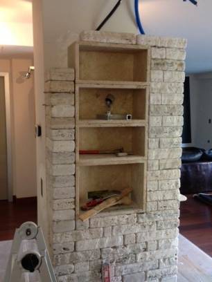 Portabottiglie di design e libreria WineMOD:progetto di un Pilastro.