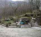 Fountain in draft of travertine